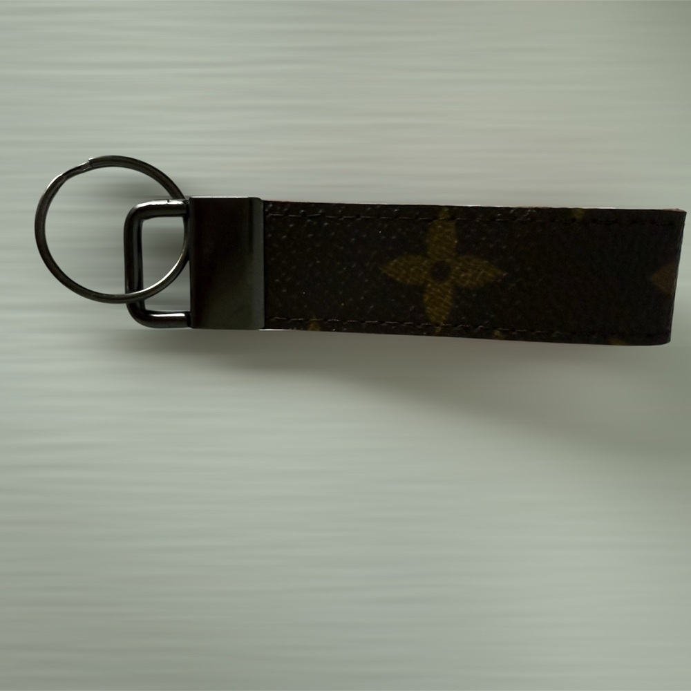 FREE With the purchase of LV Twin Pochette - 
Key Chain / Wristlet Handle